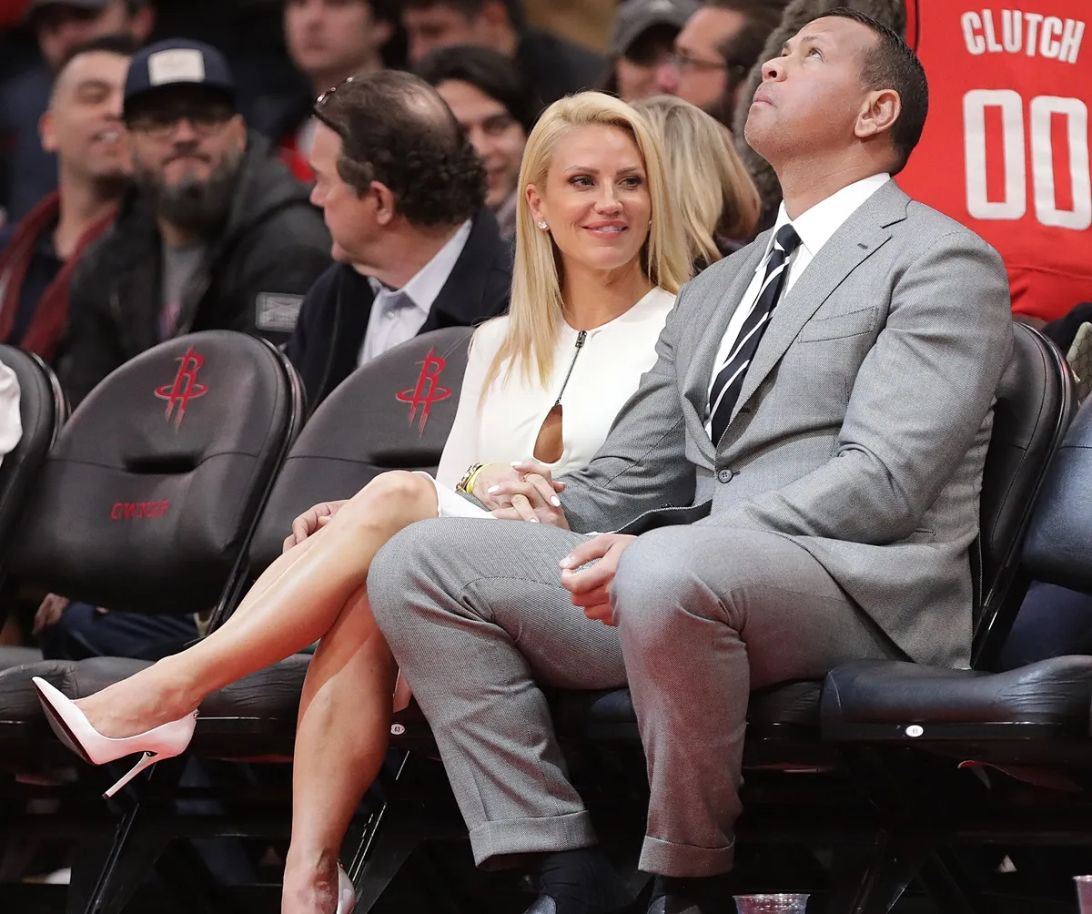 Alex Rodriguez and Jaclyn Cordeiro watch court side as the Timberwolves play the Houston Rockets at Toyota Center on January 23, 2023 in Houston, Texas