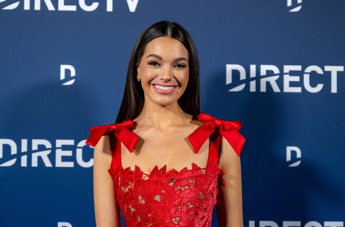 TV personality Ally Lewber wears a red dress at Kathy Hilton's holiday event on December 10