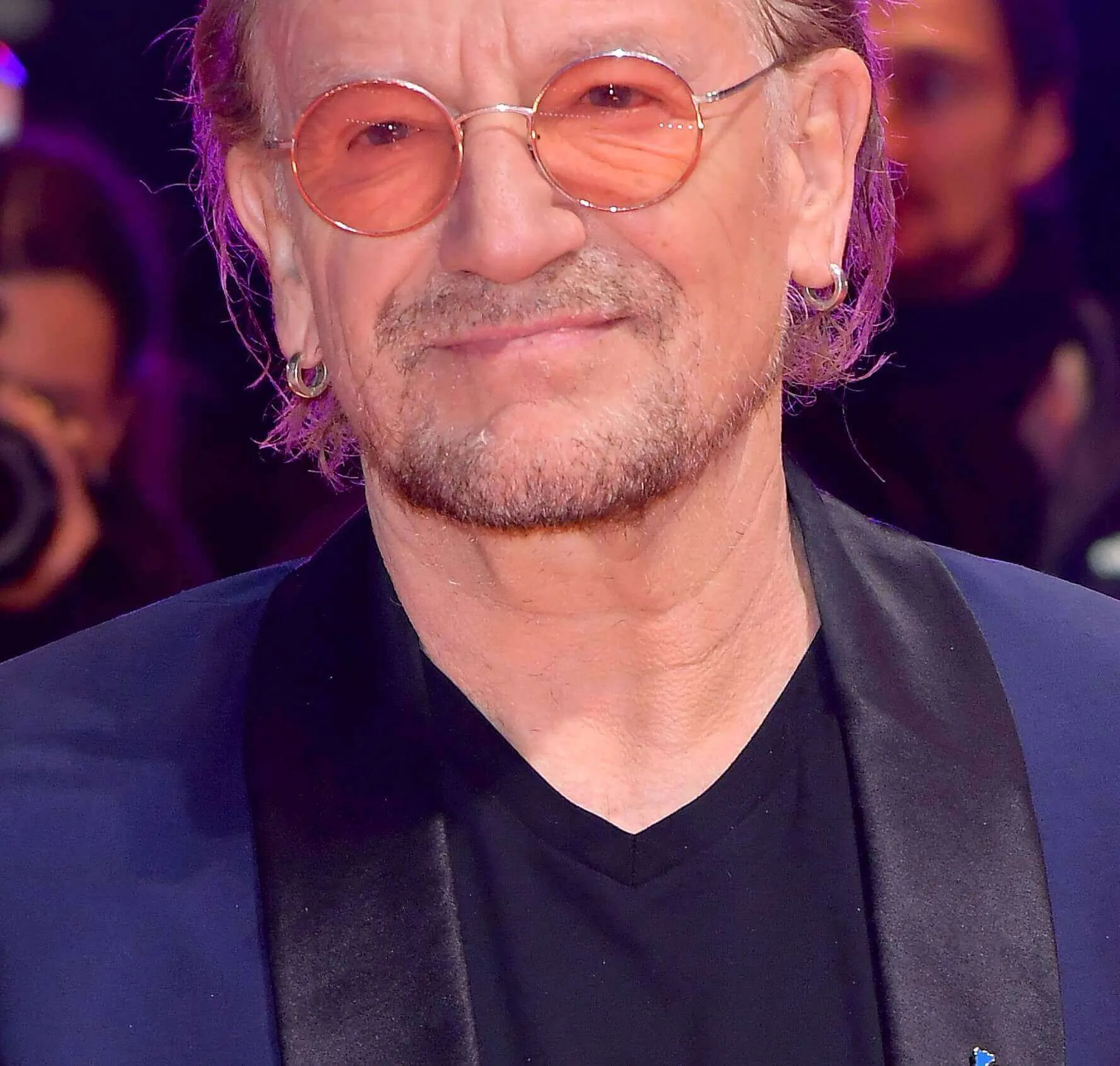 U2's Bono wearing glasses