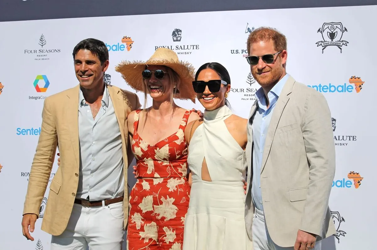 Ignacio "Nacho" Figueras and Delfina Blaquie pose for photo with Meghan Markle and Prince Harry during the Royal Salute Polo Challenge