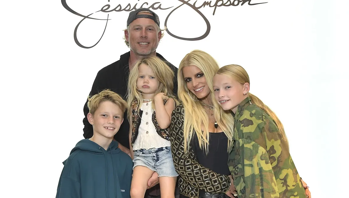 Ace Knute Johnson, Eric Johnson, Birdie Mae Johnson, Jessica Simpson, and Maxwell Drew Johnson celebrate the launch of Jessica Simpson's Fall Collection with fans and a special performance by the LA Roller Girls at Nordstrom at The Grove