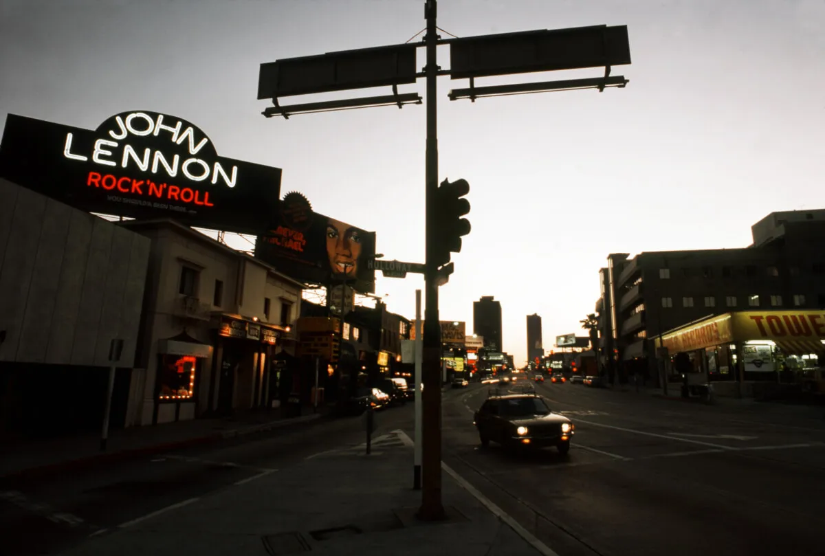 A billboard for John Lennon's album "Rock 'n' Roll."