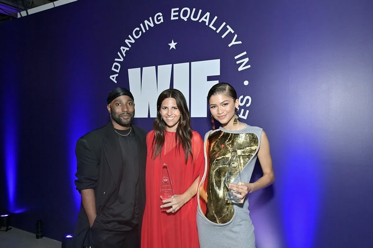 John David Washington, Ashley Levinson, and Zendaya posing at the Women in Film Honors: Trailblazers of the New Normal.